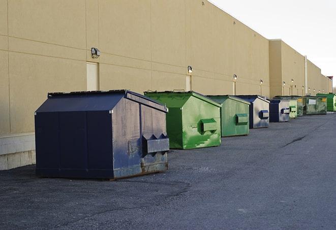 a row of industrial dumpsters for construction waste in Ardmore AL